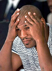 LAS VEGAS : Former heavyweight boxing champion Mike Tyson listens during the final moments of a reinstatement hearing of his boxing license before the Nevada Athletic Commission, at Cashman Field in Las Vegas on Saturday. Tyson has until Monday to undergo tests before a group of doctors who will determine if he is fit to resume boxing. If approved and relicensed, Tyson could be fighting by November. AP/PTI