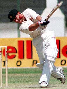 KARACHI : Australian batsman Michael Slaatter, who scored century not out, hits a boundary off Pakistani spinner Shahid Afridi, at National stadium in Karachi on Friday. Pakistan and Australia are playing their first match in Karachi. AP/PTI