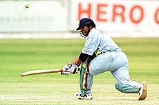 Sachin Tendulkar square cuts a shot on his way to scoring 127 runs not out in the first One Day International against Zimbabwe held in Buluwayo.— AP/PTI