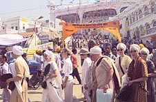 A group of women devotees from the USA going to attend the Mata Sahib Kaur Istri Sammelan at Anandpur Sahib on April 11, 1999 at Anandpur Sahib.