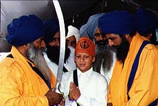 A young Sikh being baptised by Sikh saints at Anandpur Sahib on April 11, 1999