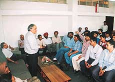 Mr Hari Jaisingh, Editor, The Tribune, addresses a group of journalists from Pakistan in Chandigarh on Friday. Also in the picture is Mr S.D. Bhambri, General Manager, The Tribune
