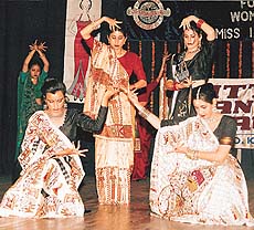 Students of the International Polytechnic for Women, sector 35, strike a pose in sarees embroidered by them at their annual show held in Tagore Theatre on Friday.