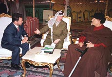 Libyan President Moammar Gadhafi holds talks with Jordan's King Abdullah  and Palestinian leader Yasser Arafat 