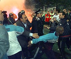Clashes break out at the end of the UEFA Cup second leg semifinal soccer match between Bologna and Olympique Marseille at Bologna's Dall' Ara stadium, Tuesday