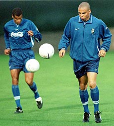 Brazil's Ronaldo (right) and Rivaldo work out with the ball during a training session in Barcelona on Monday