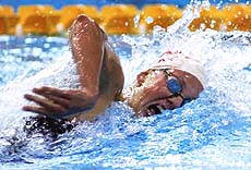 Joanne Malar powers her way to a gold medal in the women 400- meter individual medley at the Pan Am Games in Winnipeg, Manitoba, Canada, on Monday