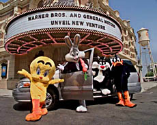 Warner Bros. cartoon characters, from left, Tweety Bird, Bugs Bunny, Sylvester and Daffy Duck introduce a specially equipped Chevrolet Venture minivan, opening a four-year marketing partnership between GM and Warner Bros., at a news conference at the Warner Bros. lot in Burbank, Calif., Thursday, Aug. 5, 1999.