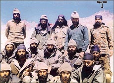 The Commanding Officer (standing second from right) with the captors of Helmet complex