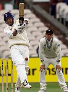 England's Graham Thorpe swings off New Zealand's Chris Cairns