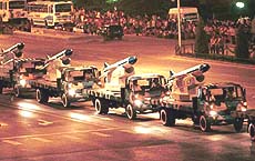 Missle launchers pass through central Beijing