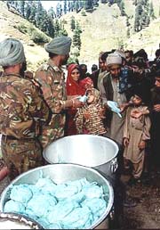 Army jawans distributing sweets