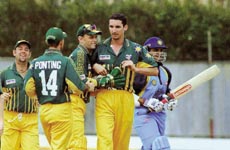 Australian bowler Jason Gillesple (without cap) celerates with teammates wicketkeeper Adam Gilchrist (third from left) Ricky Ponting and Darren Lehmann (left) as the Indian batsman Saurav Ganguly walks out during a Limited over cricket match between Australia and India