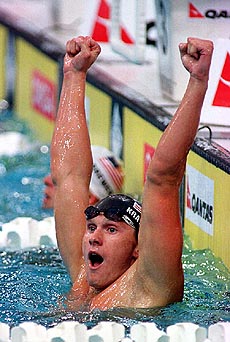 American Lenny Krayzelburg celebrates his world record swim 