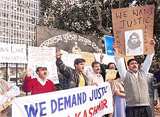 Members of Panun Kashmir demonstrating in front of Delhi police headquarters in New Delhi on Monday, demanding fresh inquiry regarding Priyadashani Mattoo's murder case