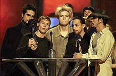 The Backstreet Boys accept the Album of the Year Award during The 1999 Billboard Music Awards show at the MGM Grand in Las Vegas on Wednesday.