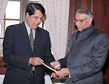 Union Finance Minister Yashwant Sinha receiving the report of task force on non-performing assets of banks from its Chairman K.V. Kamath in New Delhi on Friday.