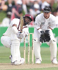 West Indies captain Brian Lara strikes the ball watched by New Zealand's wicket keeper Adam Parore on the 3rd day of the 2nd test match played at the Basin Reserve, in Wellington, New Zealand on Tuesday