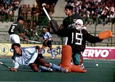 Pakistani goalkeeper Ahmed Alam trying to save a hit from India's Gagan Ajit Singh during the first Pepsi Indo-Pak hockey test at National Stadium,  New Delhi on Wednesday 