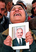 A Jordanian woman weeps