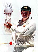 Mark Taylor holds up the trophy after defeating England — AP/PTI