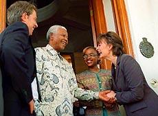 South African President Nelson Mandela and Cherie Blair.