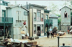 A wooden set being prepared to be demolished