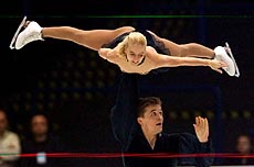 Mariusz Siudek from Poland holds up his partner Dorota Zagorska during their performance in the pairs' free skating at the European Figure Skating Championships in Prague on Wednesday. 