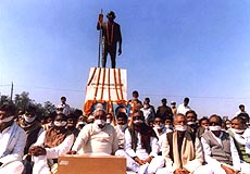 Bihar state Congress leaders staged a dharna with their mouths tied under the shadow of Mahatma Gandhi's statue at Gandhi Maidan in Patna on Saturday in protest against the Jehanabad carnage. 