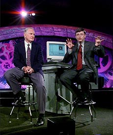 Microsoft Corp. CEO Bill Gates (right) gestures as Intel Corp. CEO Craig Barrett (left) listens as they talk about their company's emphasis on joint commitment to leadership and innovation in the global workstation market, on Wednesday morning, at the annual Workstation Leadership Forum in Burlingame, Calif.