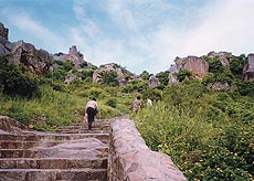 Climbing the steep steps at Golconda Fort