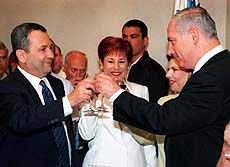 Former rivals, Israeli Prime Minister Ehud Barak (left) his wife Nava (center) and former Prime Minister Benjamin Netanyahu (right) and his wife Sara