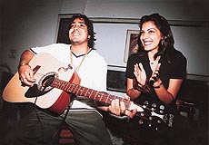 Singer Mika strums his guitar, while super-model Mehar Bhasin claps at a press conference held by NIFD, Chandigarh, in Panchkula on Saturday
