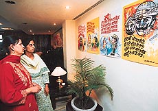 Visitors at an exhibition of poster-poems, "Kargil shaheedon ko salaam" at a hotel in Sector 22 on Monday