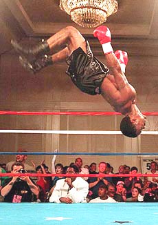 IBF junior welterweight champion Terron Millett of St. Louis celebrates his victory over challenger Virgil McClendon during a championship bout in Las Vegas on Saturday. Millett retained his title when he stopped McClendon at 1:50 of the final round of their scheduled 12-round bout