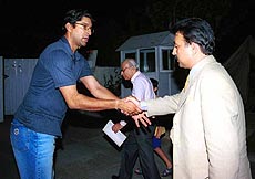 Wasim Akram (left) skipper of Pakistani cricket team being received by Mujeen-ur-Rehman, newly appointed Chairman of Pakistan Cricket Board in Islamabad on Tuesday. 