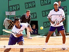 Leander Paes (left) and Mahesh Bhupathi of India in doubles action against Nicklas Kulti and Mikael Tillstroem of Sweden during their semifinal tennis match at the French Open at Roland Garros stadium in Paris on Thursday