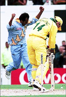 India's Robin Sing (left) celebrates taking Australian Ricky Ponting's wicket during the super-six stage of the Cricket World Cup at the Oval , London, on Friday