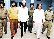 The three accused being taken to be produced in the court in Chandigarh on Friday