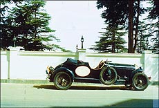 The long low bonnet and 4-spoke steering — so typical of Bugattis