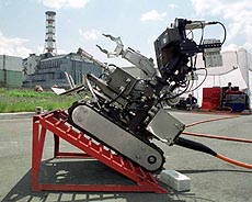 The new mobile Pioneer robot, sponsored by the US Department of Energy and NASA, demonstrates its technical abilities during its presentation in front of the Chernobyl Nuclear Power plant in Ukraine.
