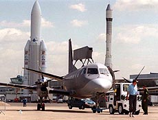 One of six Swedish Air Force Saab planes equipped with an early warning radar, named ERI EYE, is rolled to its exhibition pad during preparations for the opening of the 43rd Bourget Air Show, north of Paris .