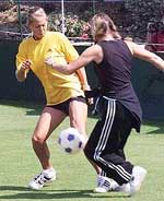 Russia's tennis star Anna Kournikova playing football with her mother Alla, at Devonshire Park in Eastbourne, Tuesday