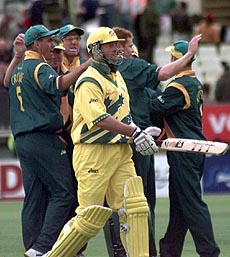 South Africa celebrate Shaun Pollock's dismissal of Mark Waugh (foreground) during their semi-final game against Australia in the 1999 Cricket World Cup at Edgbaston, Birmingham, on Thursday