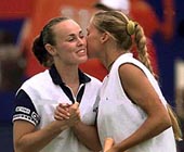 EASTBOURNE : Switzerland's Martina Hingis, left, and her doubles partner Anna Kournikova of Russia, embrace as they move on to the doubles semi-finals of the Direct Line International Ladies Tennis Championships at Eastbourne — AP/PTI