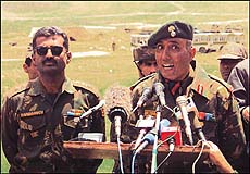 Lt.Col. M. B. Ravindernath (left) and Col. Khushal Thakur, commanding officers of units involved in the recapture of Point 5140 and Point 4590 adjacent to Tololing feature in Dras sub-sector, address mediapersons near battle zone on Monday.