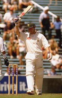 South African batsman Daryll Cullinan signals his double century against New Zealand on the second day of the first cricket test at Eden Park in Auckland on Sunday 