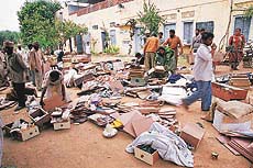 Household goods lie scattered after a demolition drive by the enforcement staff of HUDA at Manav Kendra of Ruhani satsang at Bhainsa Tibba village in Panchkula on Friday