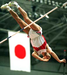 Andrei Tivontschik of Germany is on his way to clear the bar of 5.50 meters in the men's pole vault final during the World Indoor Track and Field Championships in Maebashi, northwest of Tokyo, on Saturday.