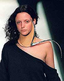 A model wears a silver and leather necklace by London fashion student George Sayer, during a show by students of Central St Martin's College that marks the end of the annual London Fashion Week
